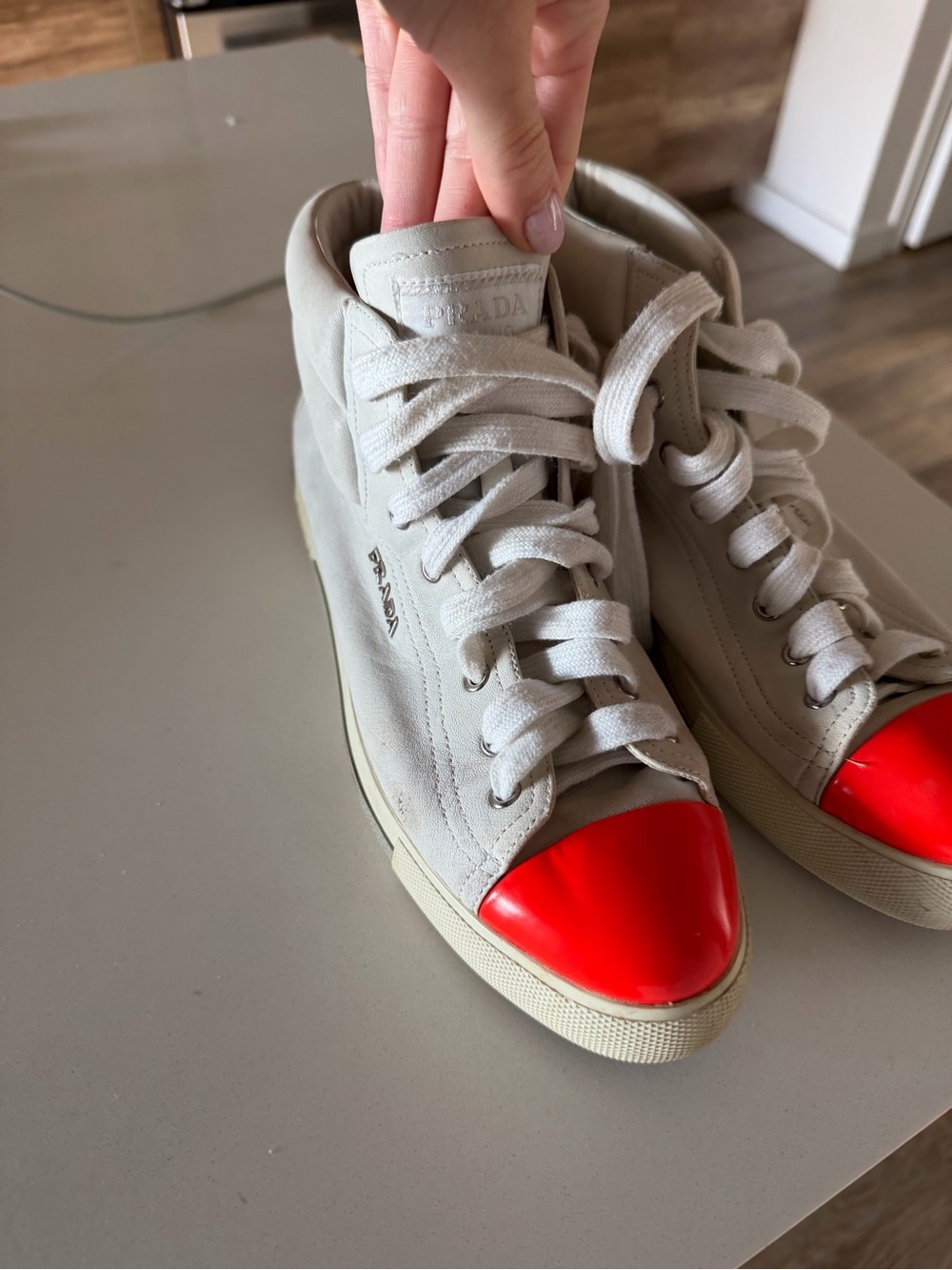 Prada Women’s High-Top Sneakers in Light Gray with Red Patent Toe